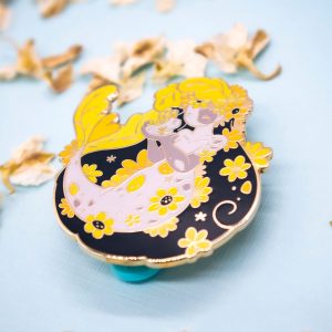 Vibrant yellow fantasy mermaid enamel pin by Evy Benita.
