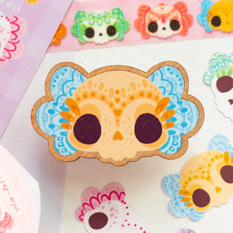 Cute Day of the Dead inspired axolotl pin badge. Made with responsibly sourced wood.